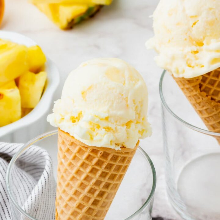 Pineapple ice cream in a cone