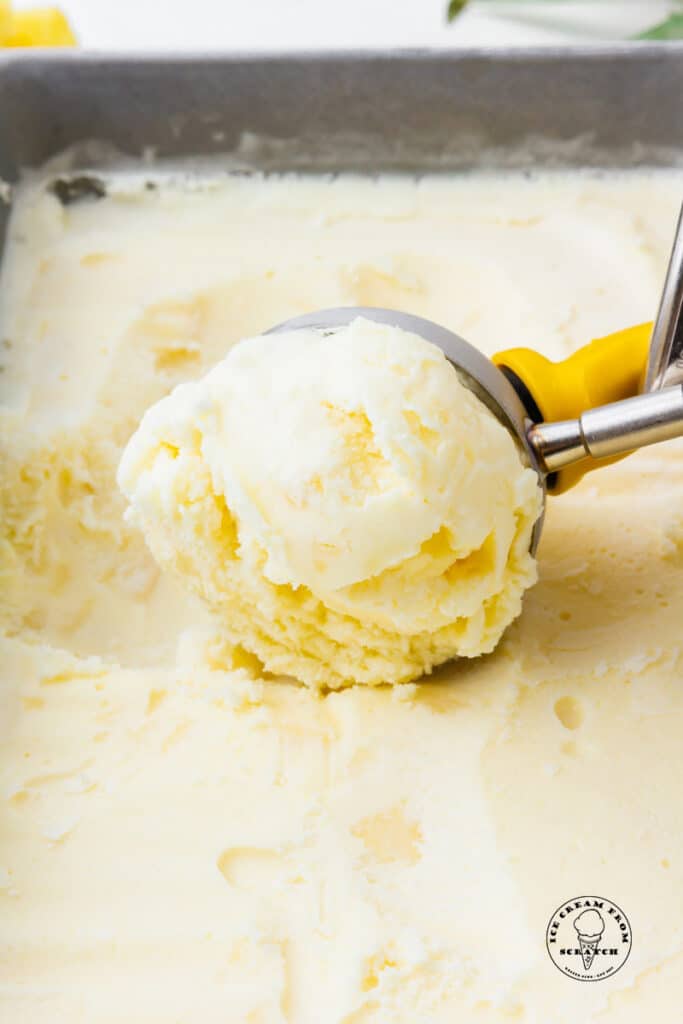 scooper scooping pineapple ice cream
