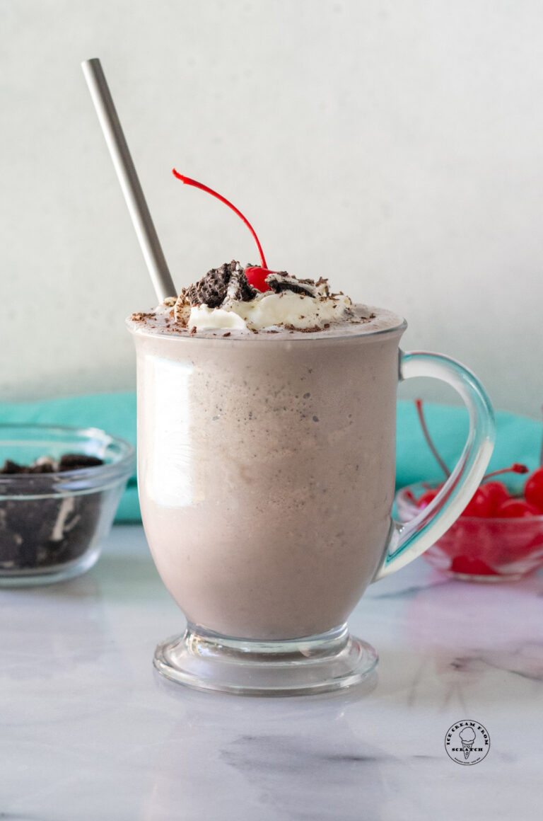 cookies and cream milkshake in a clear glass