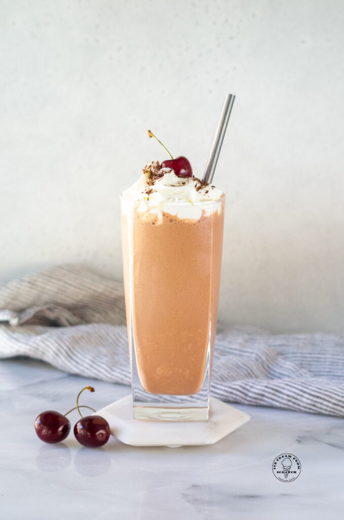 Chocolate Peanut butter Milkshake on a white coaster