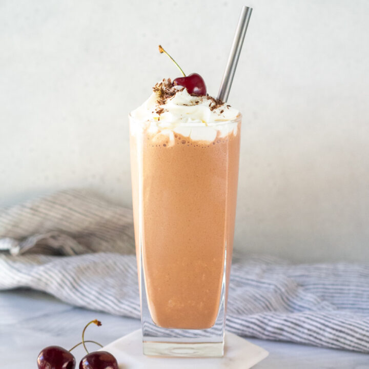 Chocolate Peanut butter Milkshake on a white coaster
