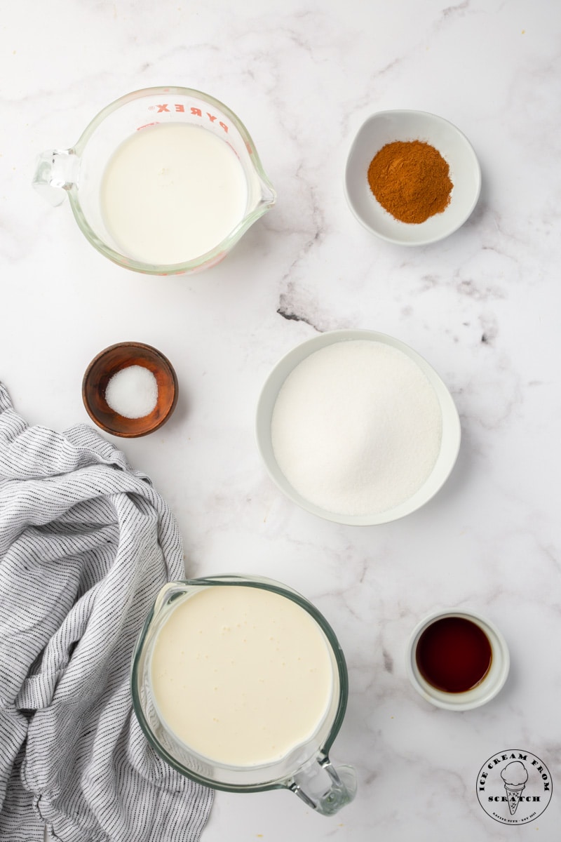 The ingredients needed to make an egg free cinnamon ice cream from scratch.