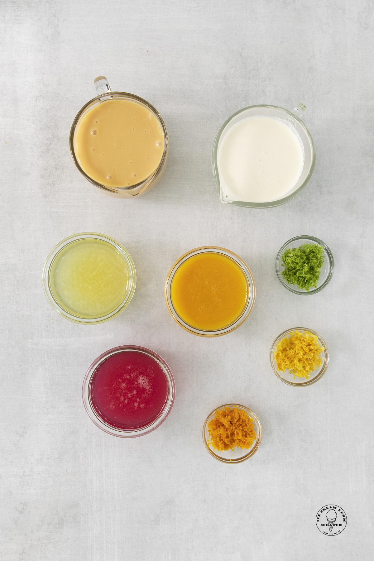 The ingredients needed to make rainbow sherbet, including fruit juice, citrus zest, condensed milk.