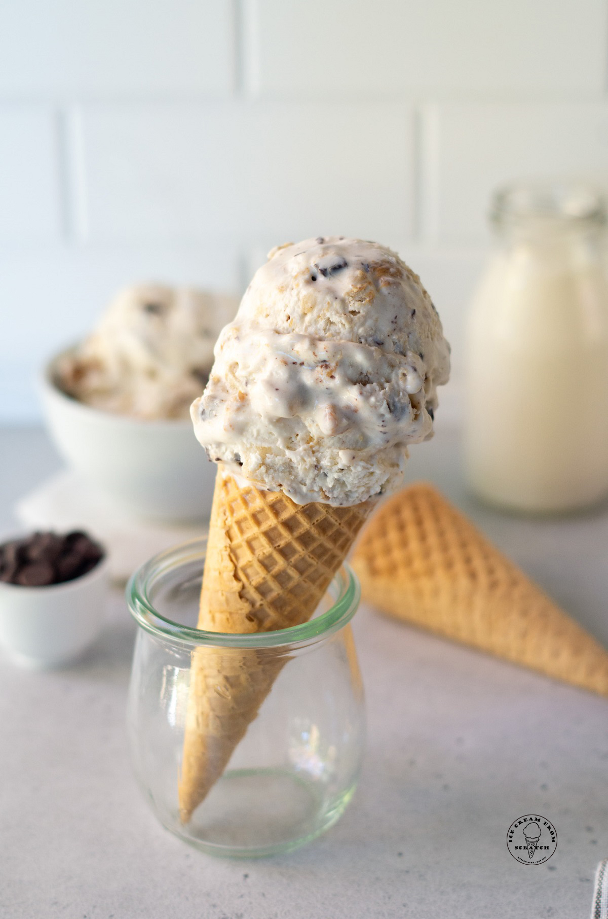 a sugar cone topped with scoops of homemade fat elvis ice cream