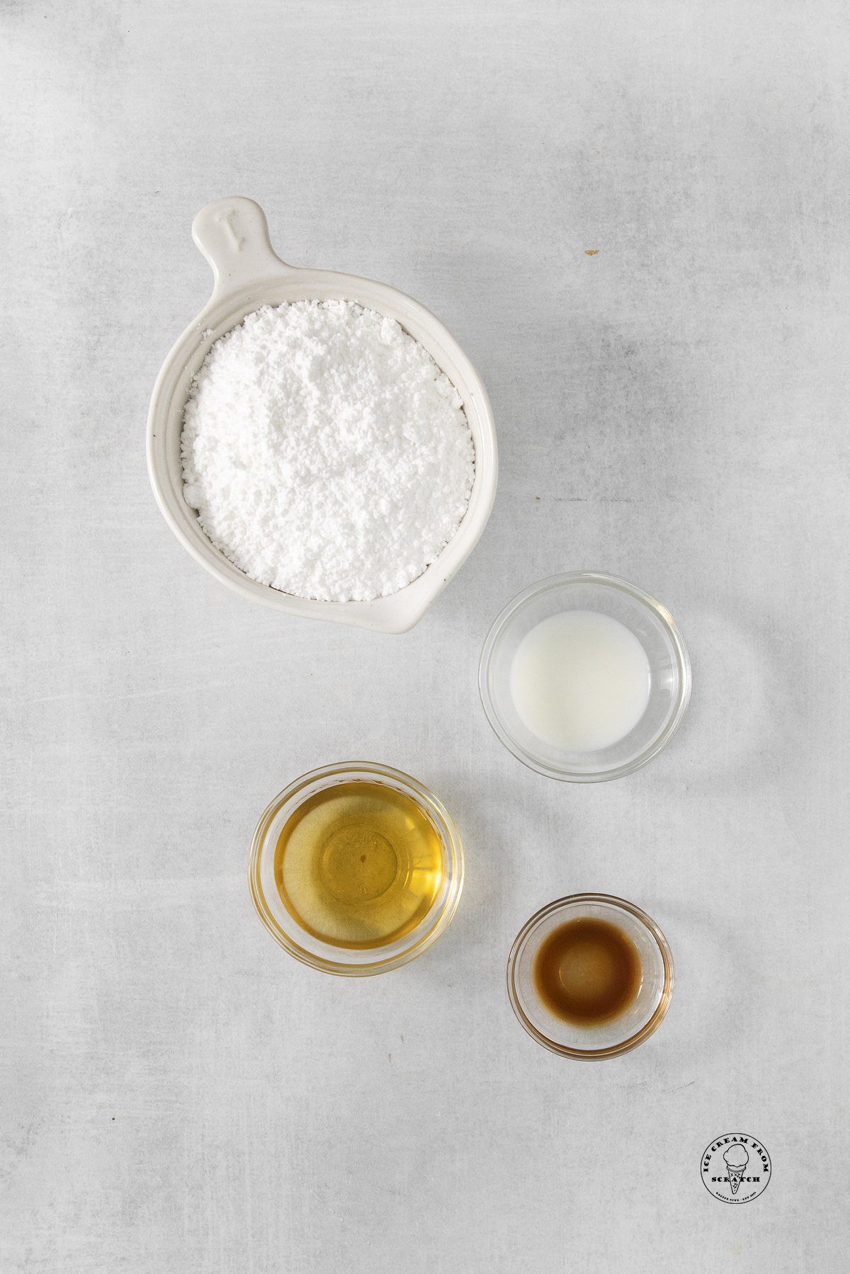 The ingredients needed to make a rum vanilla glaze for bread pudding