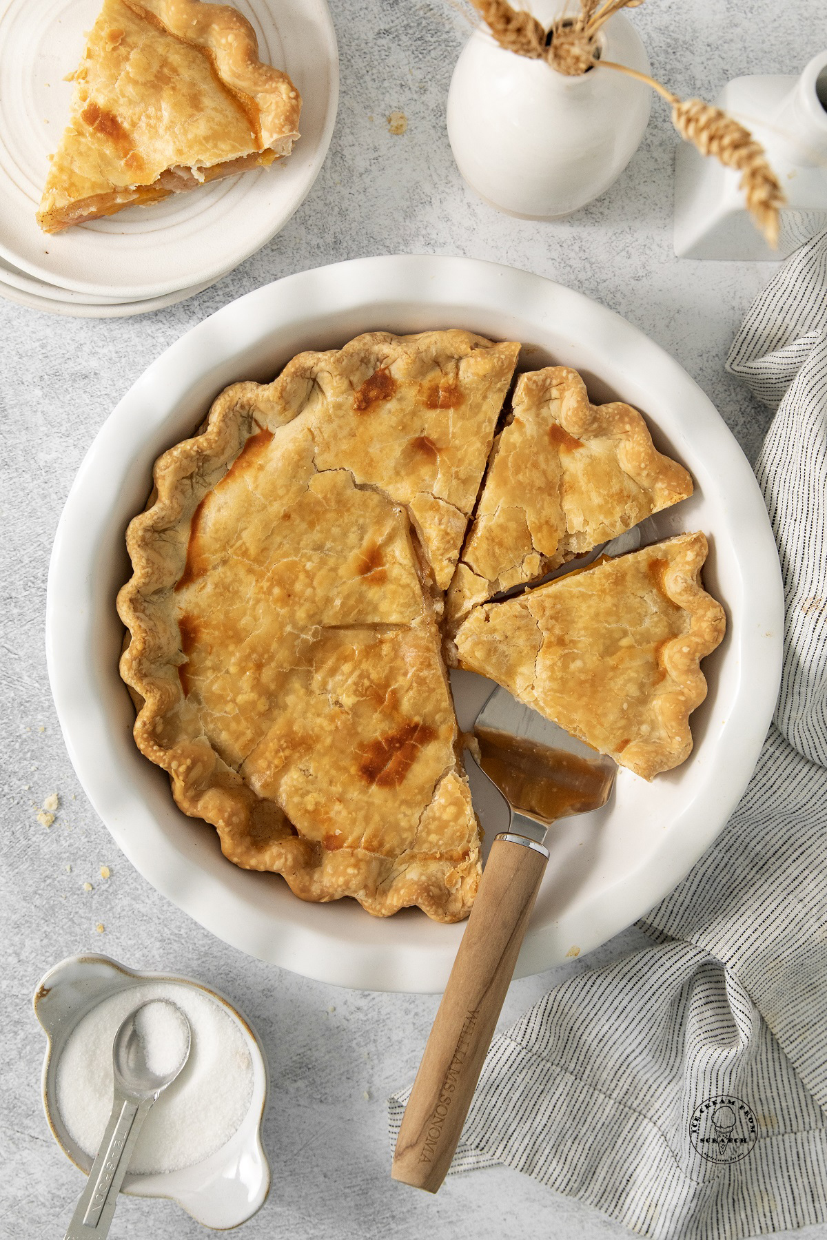 canned peach pie, sliced and served.