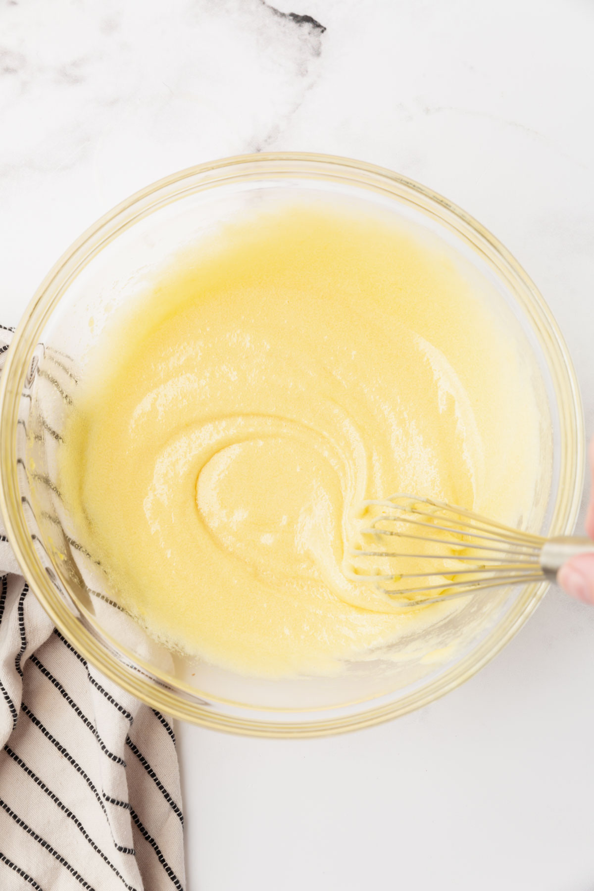 egg yolks and sugar mixed in a bowl