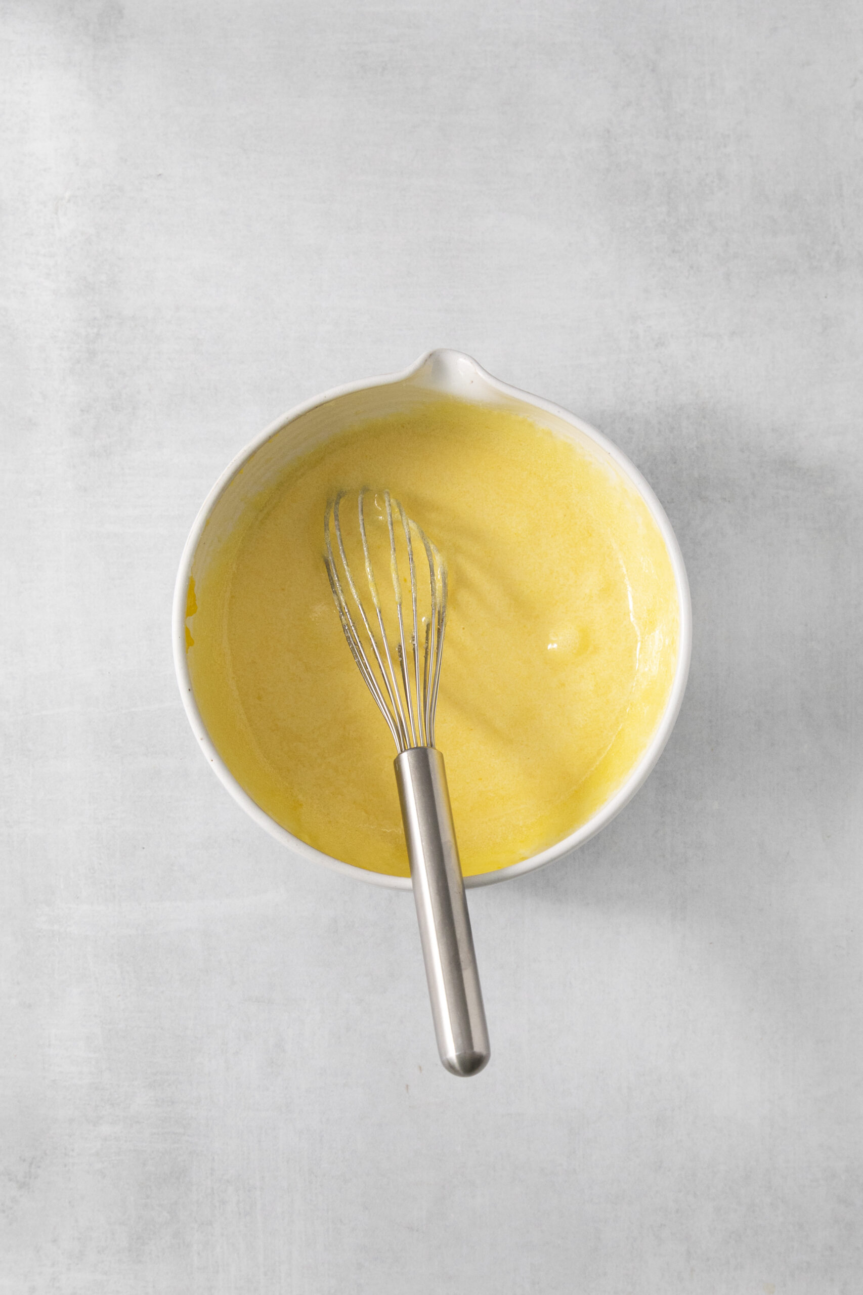 egg yolks and sugar mixed in a bowl