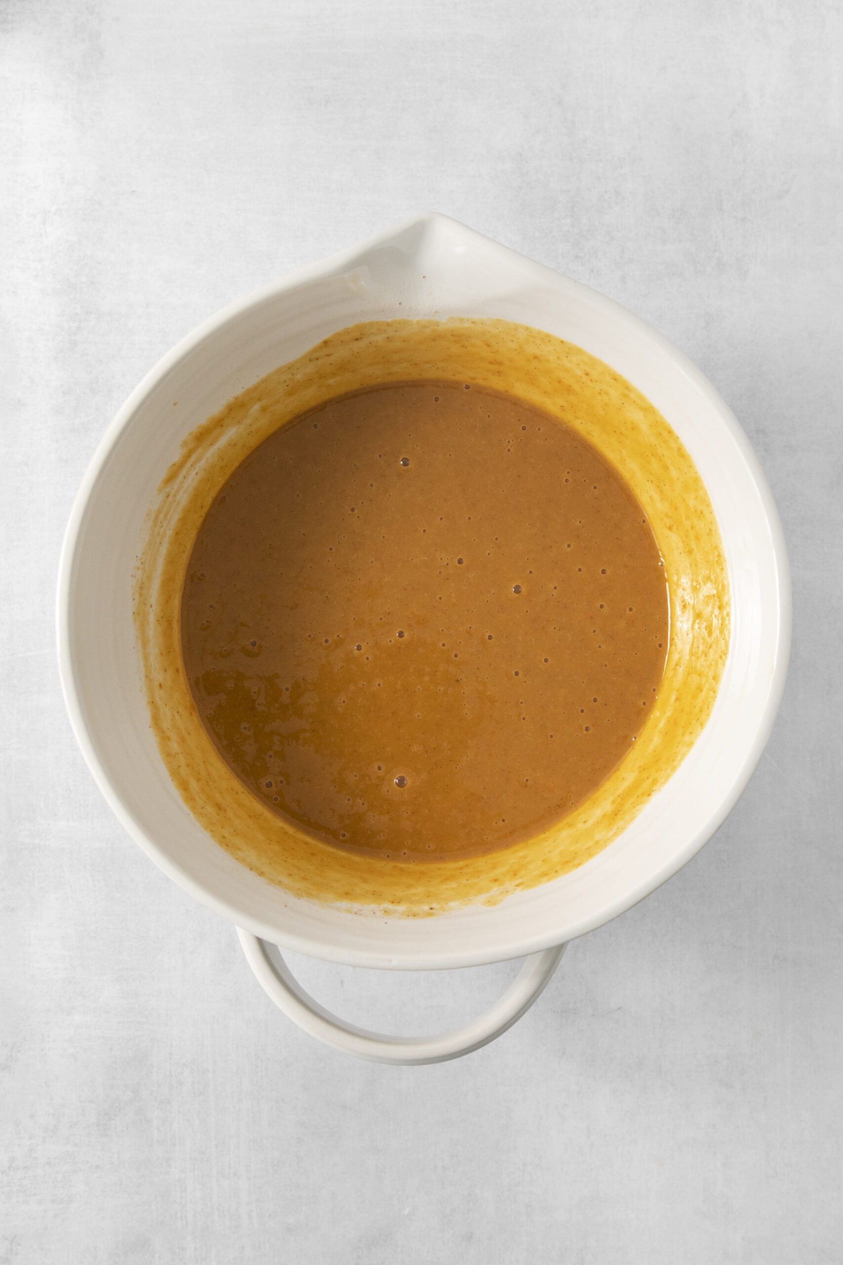 pumpkin pie filling in a mixing bowl