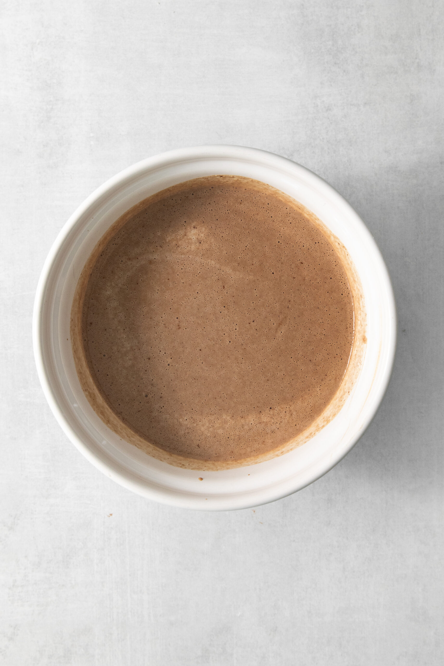 custard mixture for hot chocolate ice cream in a bowl