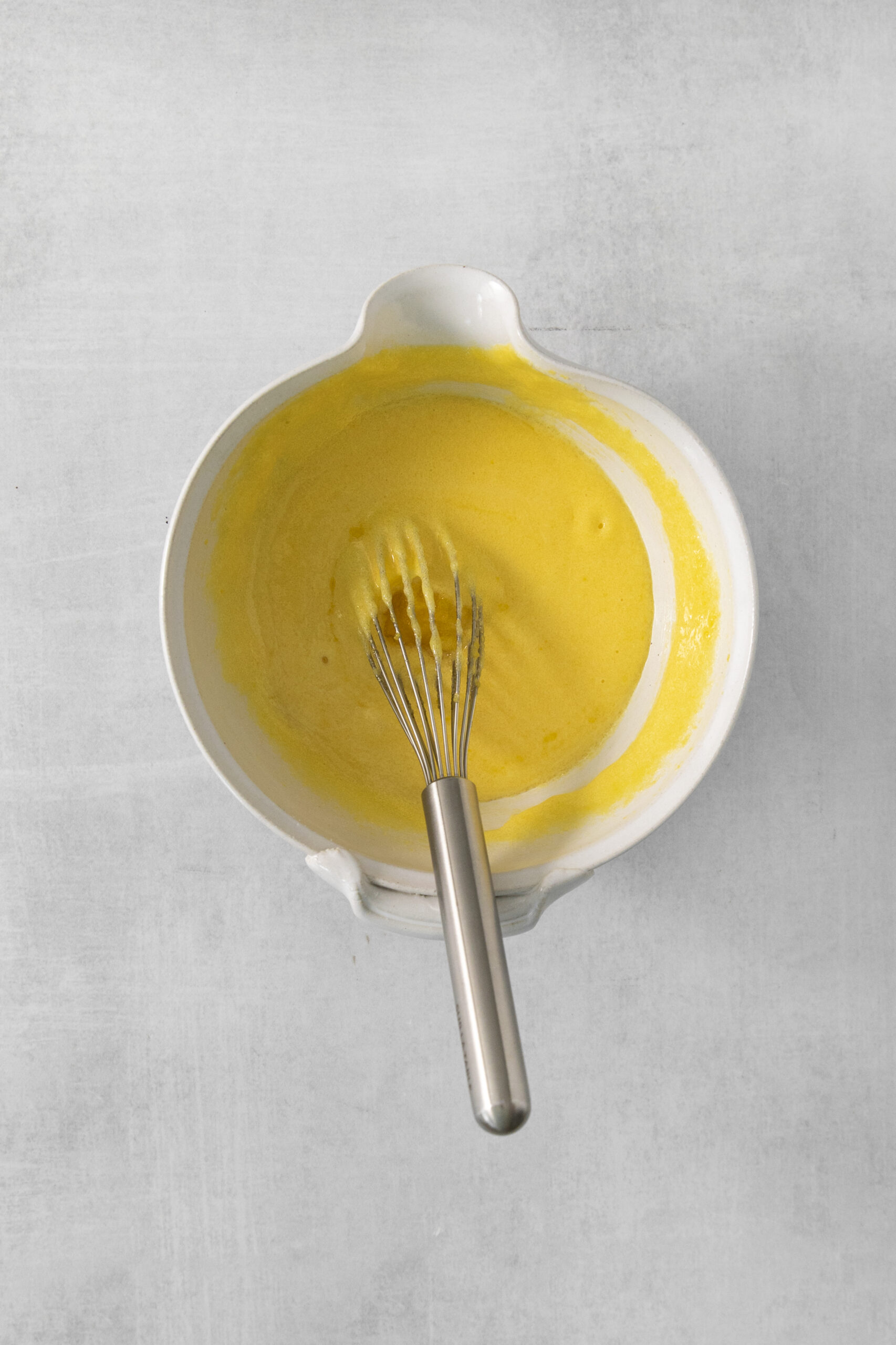 eggs and sugar mixed in a bowl