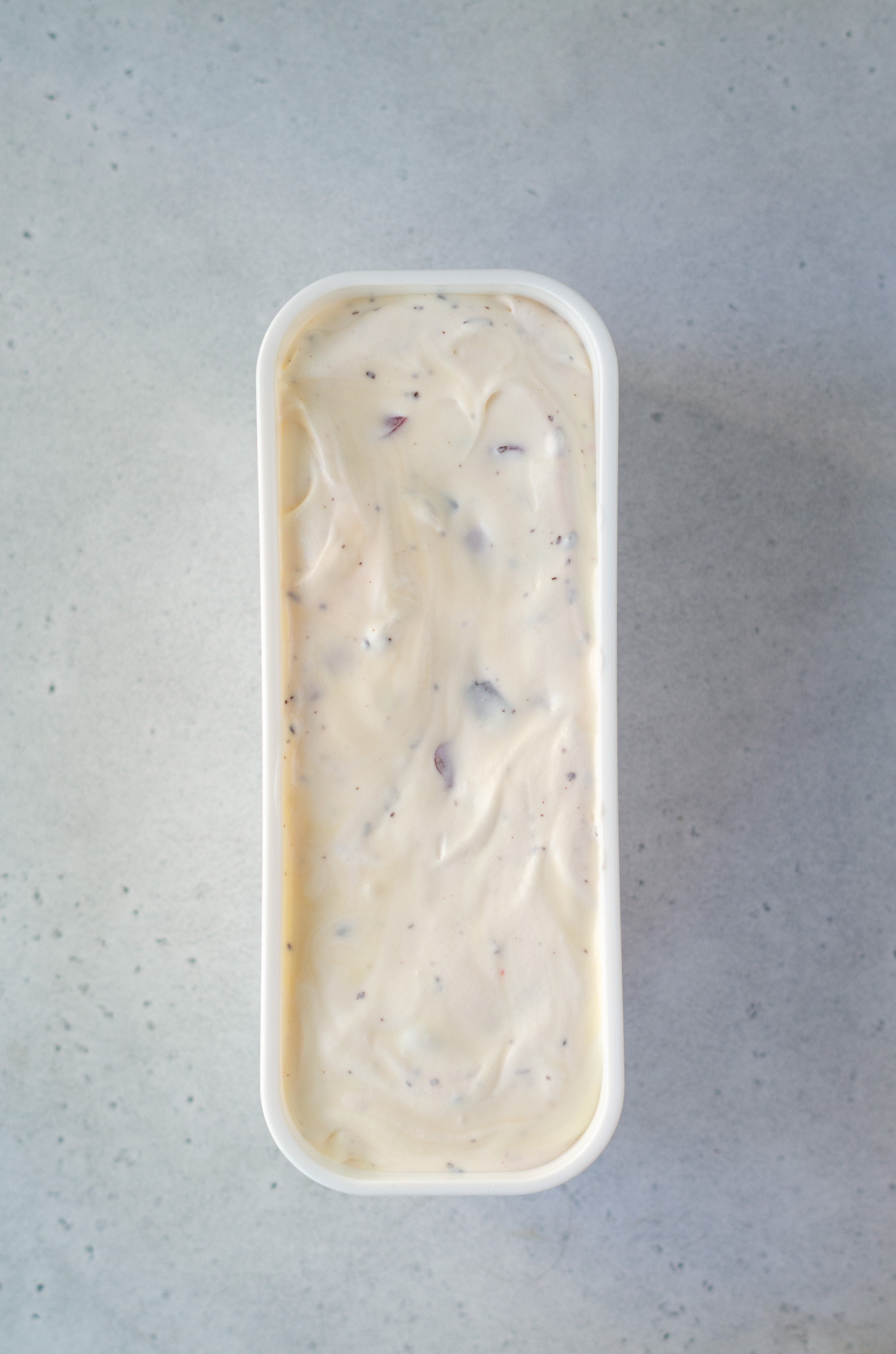 cherry cordial ice cream in a ice cream container