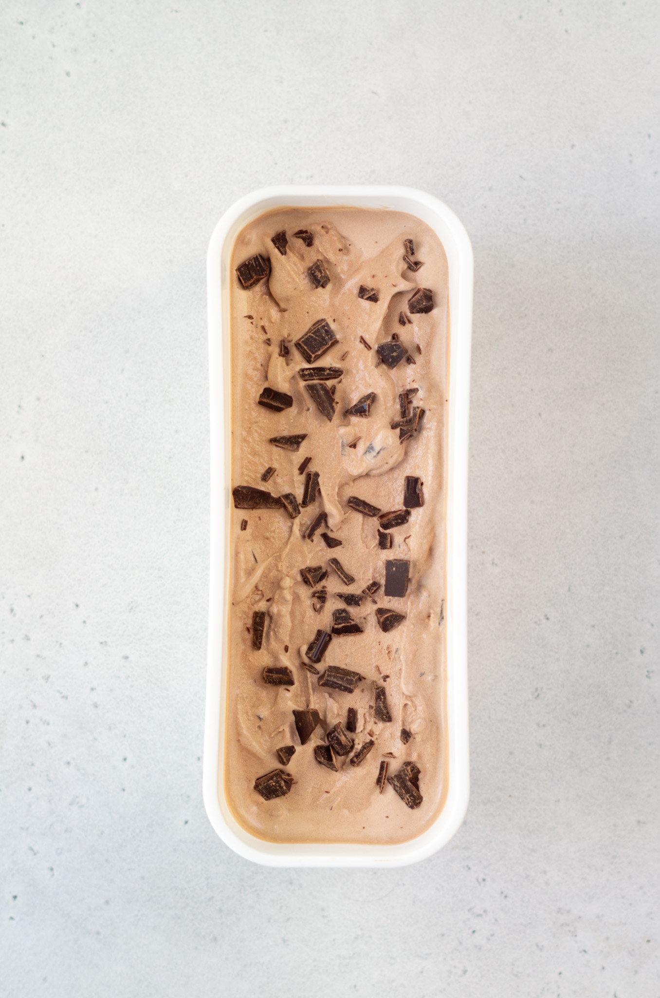 chocolate chocolate chip ice cream in an ice cream container