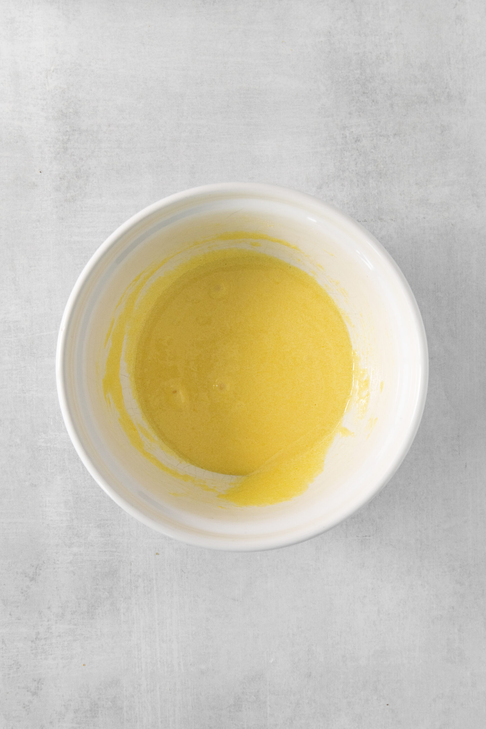 eggs and sugar mixed in a bowl