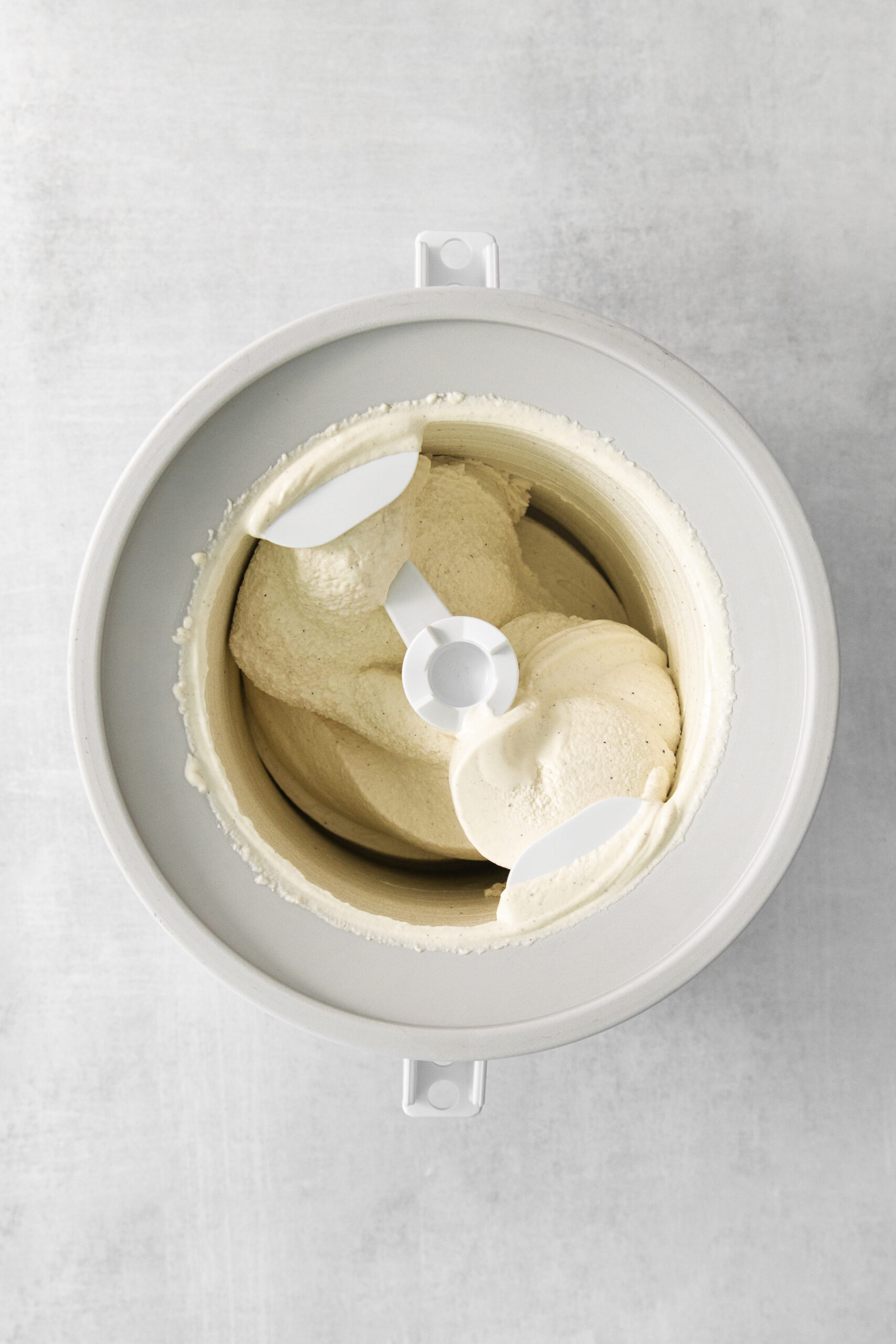 ice cream mixture in an ice cream mixer bowl