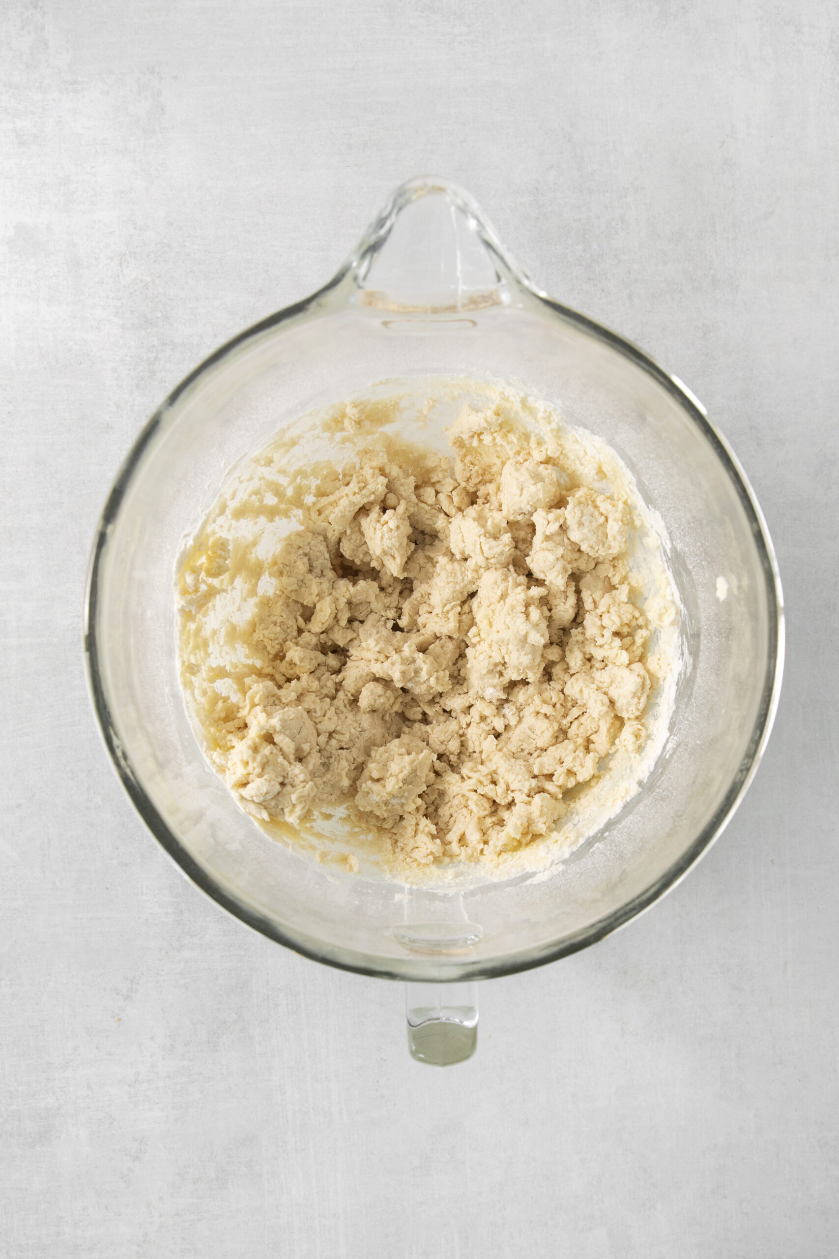 cookie dough in a clear mixing bowl