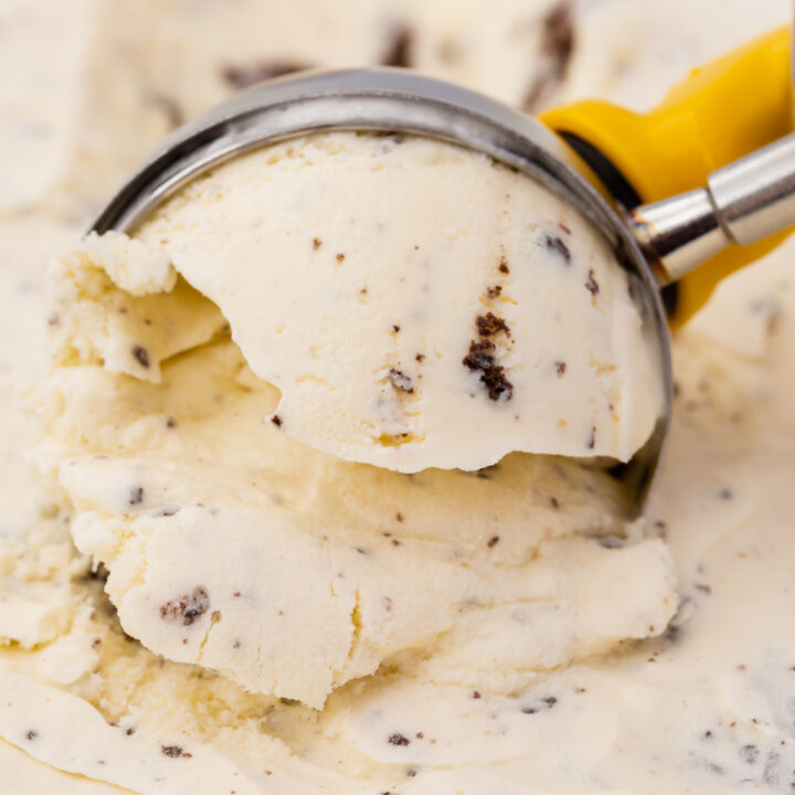 ice cream scoop dipped into cookies and cream ice cream